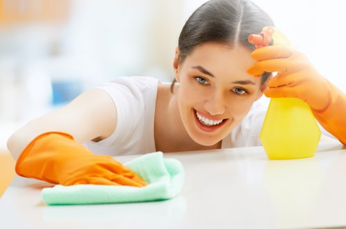 Technician wearing PPE during carpet cleaning